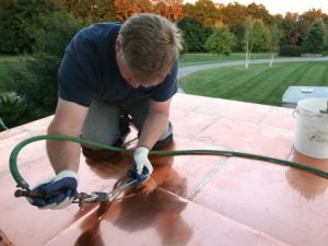 installing a flat-seam copper roof
