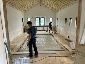 radiant heated floors in pool barn